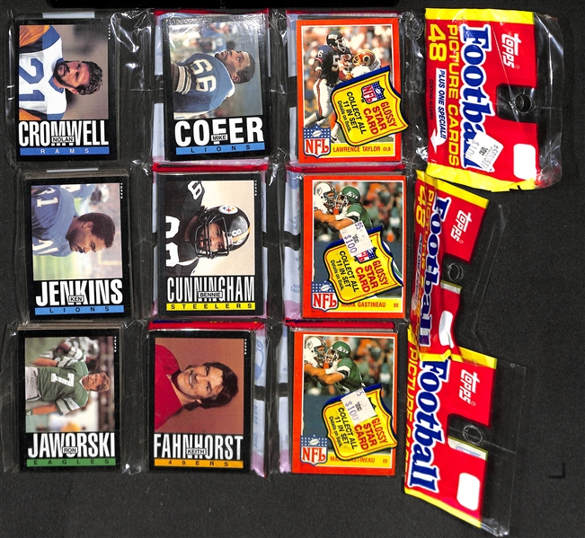 Lot of 18 Unopened Topps 1985 Football Rack Packs - 18 packs with 48 Cards/Pack