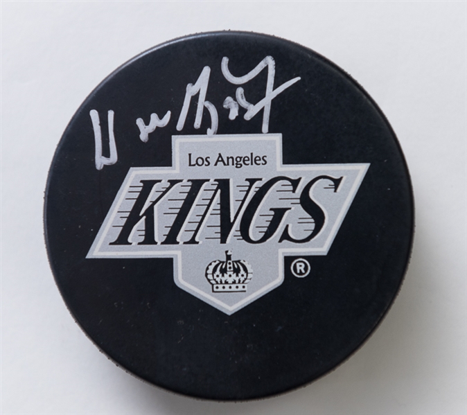 Wayne Gretzky Autographed Hockey Puck - Upper Deck Certified