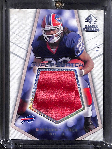 Lot of 7 Football Patch/Jersey Cards w. Russell Wilson