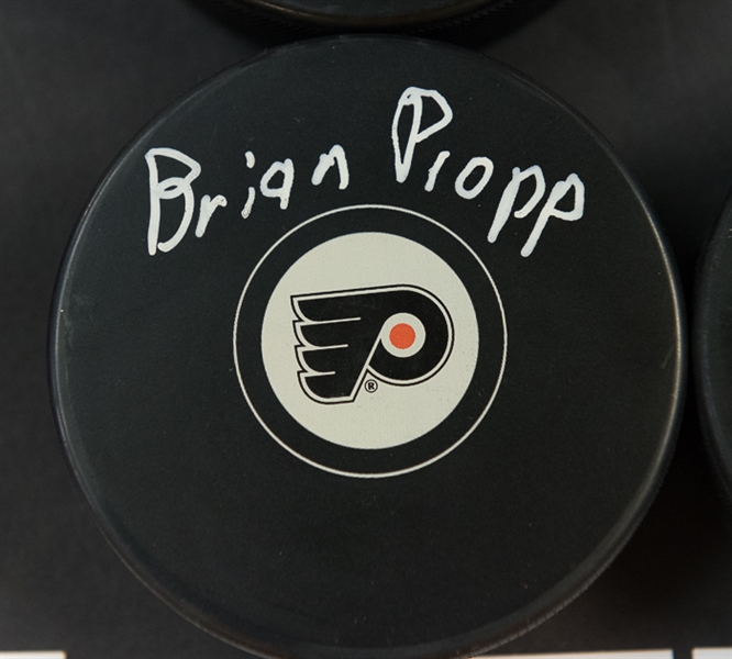 Lot Of 4 Flyers Signed Hockey Pucks w. Clarke & Barber - JSA
