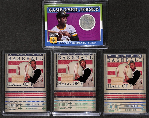 Lot of 4 Roberto Clemente Jersey & Bat Cards
