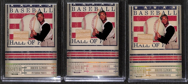 Lot of 4 Roberto Clemente Jersey & Bat Cards