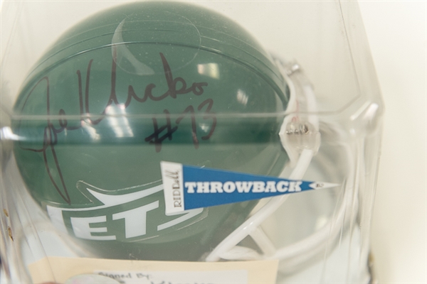 Lot of 4 Signed Football Mini Helmets w. Curtis Martin, Joe Klecko, Santana Moss, & Dan Morgan