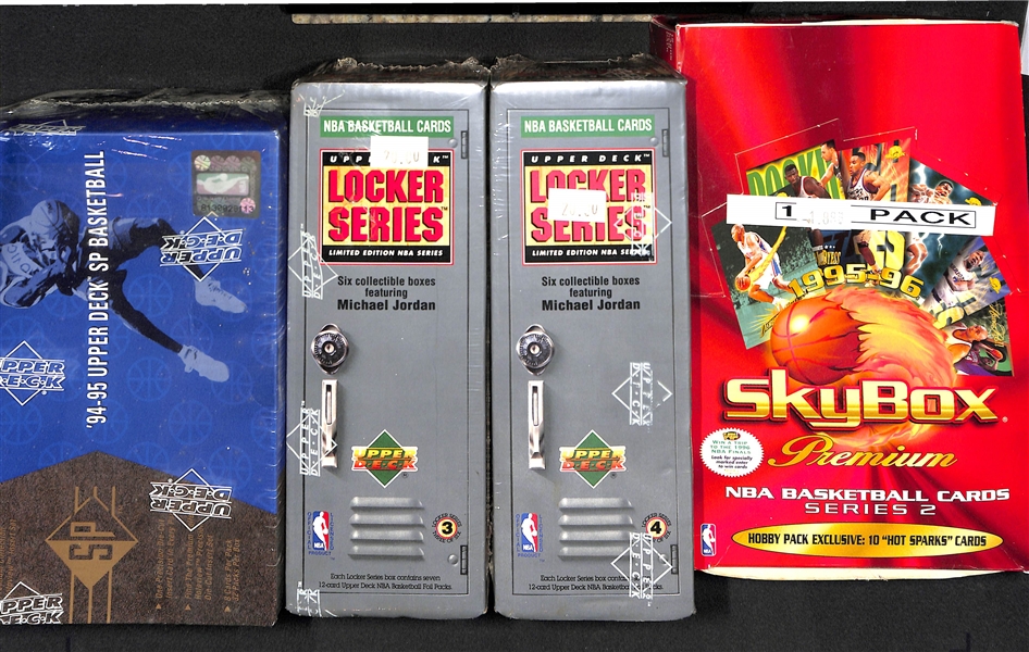 Lot of (4) Unopened Basketball Boxes (one 1994-95 Upper Deck SP, one 1995-96 Skybox Premium, and two 1991-92 Upper Deck Locker Series Boxes)
