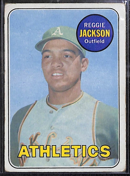 Rookie Cards of HOFers Reggie Jackson (1969 Topps) and Jim Catfish Hunter (1965 Topps)