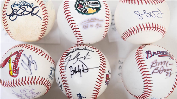 Lot of (11) Signed Baseballs (Cardinals and Braves) inc. A. Galaraga, J. Oquendo, Rasmus, Taguchi, B. McCann