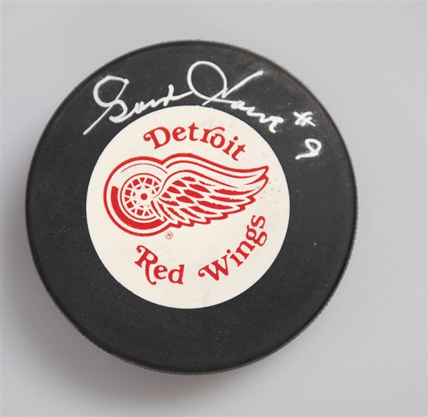 Gordie Howe Signed Red Wings Hockey Puck  - JSA Auction Letter