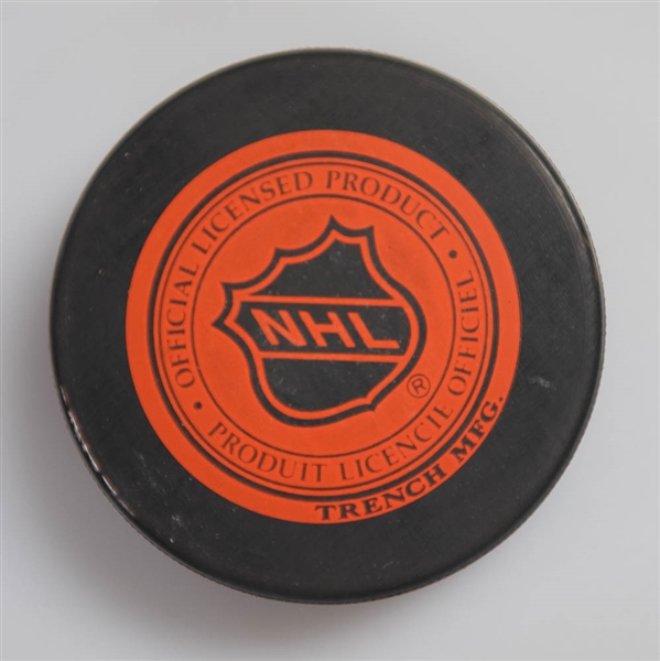 Gordie Howe Signed Red Wings Hockey Puck  - JSA Auction Letter