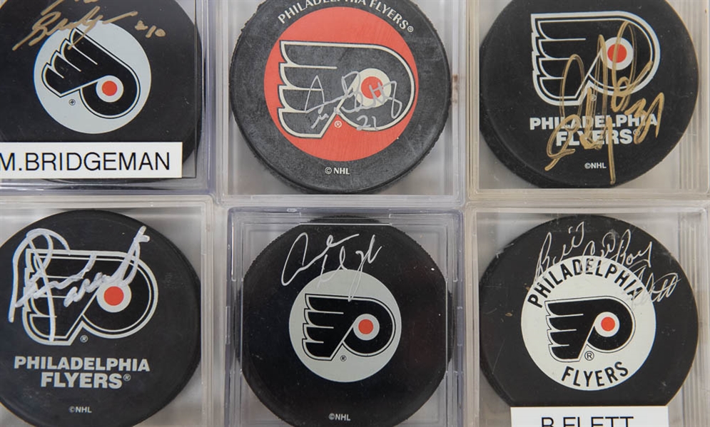 Lot of 11 Philadelphia Flyers Signed Hockey Pucks w. Bob Clarke - JSA Auction Letter
