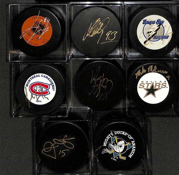 Lot of 8 Signed Hockey Pucks w. Teemu Selanne - JSA Auction Letter
