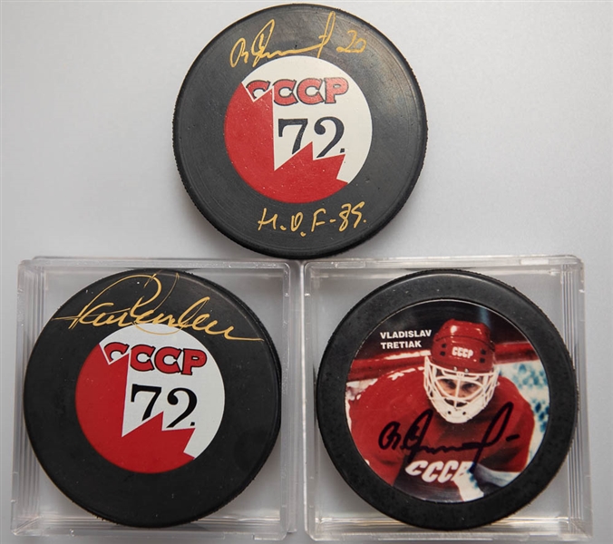 Lot of (3) CCCP '72 Russian Hockey Pucks - Includes (2) Vladislav Tretiak and (1) Paul Henderson  - JSA Auction Letter