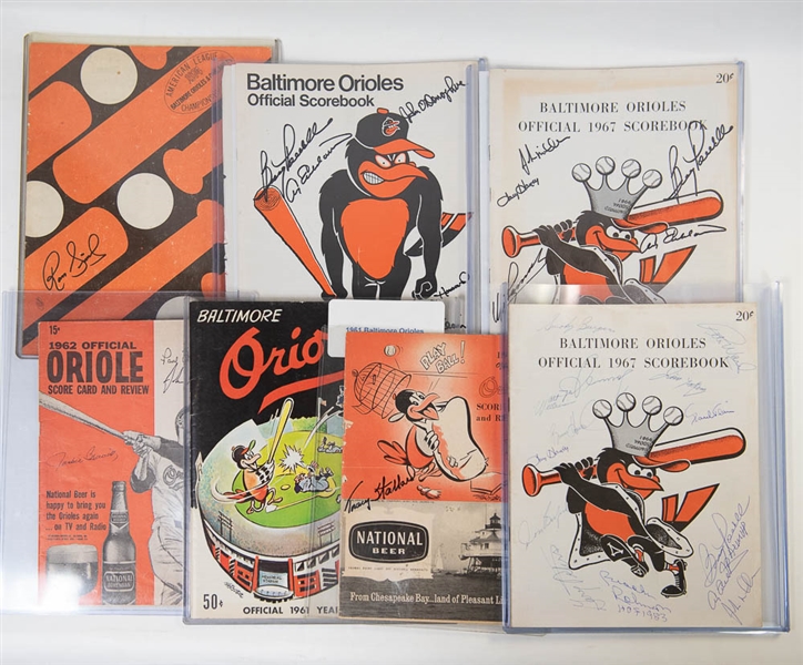 Lot of 6 Orioles Signed 1960s Yearbooks & Score Cards