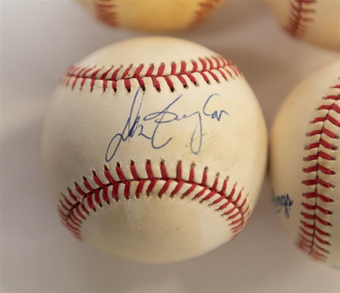 Lot of (4) Signed Official World Series Baseballs (1981-Nettles, 1986-Baylor, 1987-Baylor, 1989-Rettenmond) - JSA Auction Letter