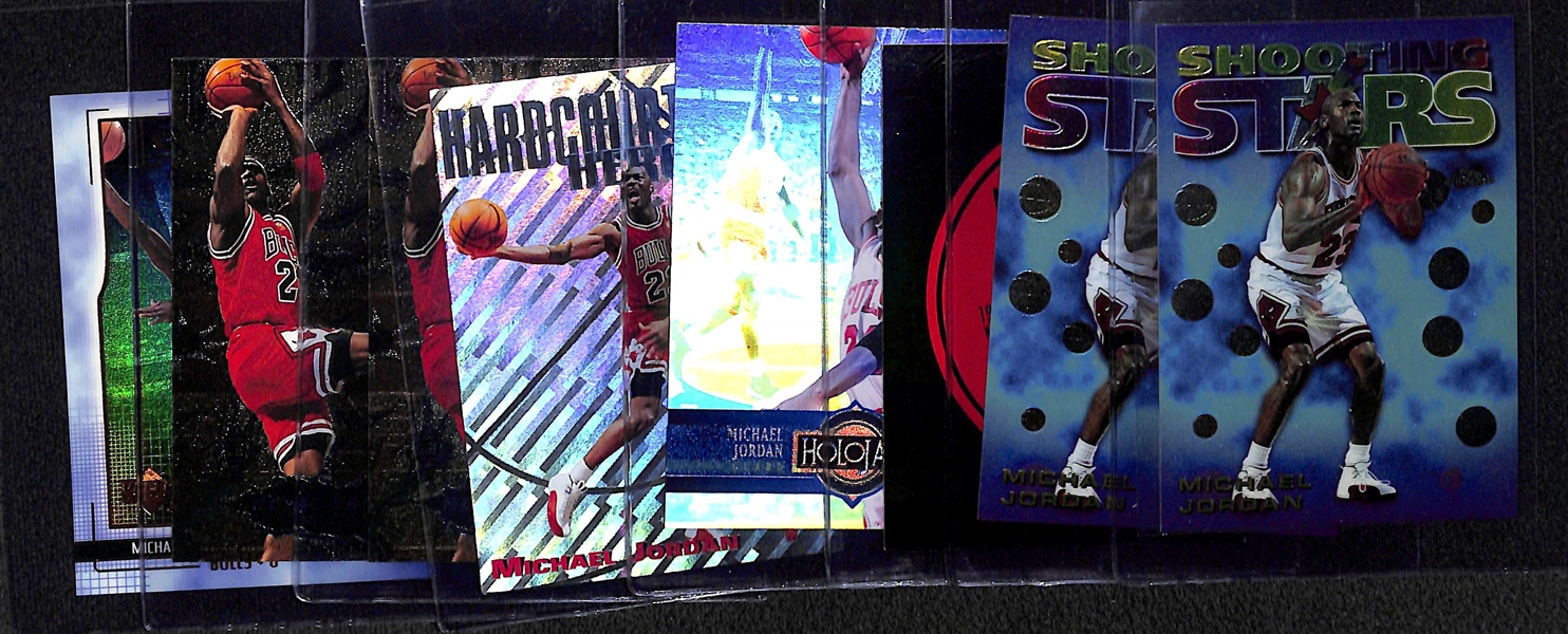 Lot of (8) Michael Jordan Insert Cards - (2) 97-98 Chrome Shooting Stars, 97-98 UD Record Collection, 93-94 Holojam, 97-98 Hardcourt Heroics, (2) 96-97 Fleer Metal Shredders, and 99-00 upper Deck...