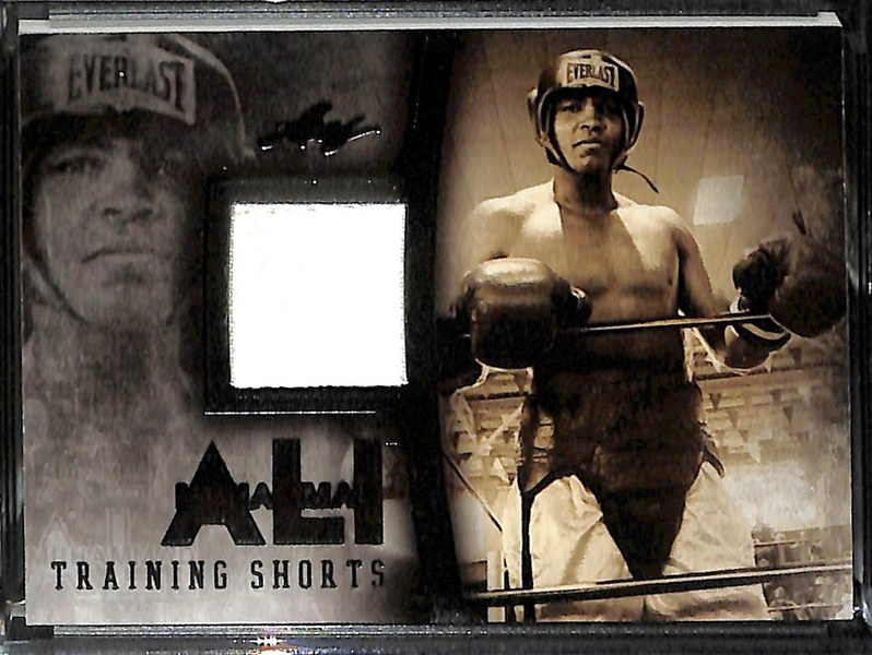 Lot of (2) 2016 Leaf Muhammad Ali Collection Cards - 1/1 Black Printing Plate & Fighter Worn Training Shorts Card