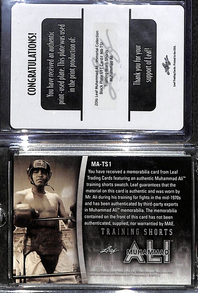 Lot of (2) 2016 Leaf Muhammad Ali Collection Cards - 1/1 Black Printing Plate & Fighter Worn Training Shorts Card