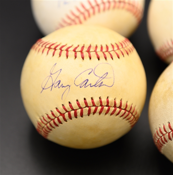 (4) Signed Baseballs - Pete Rose, Gary Carter, Johnny Mize, Harvey Haddix