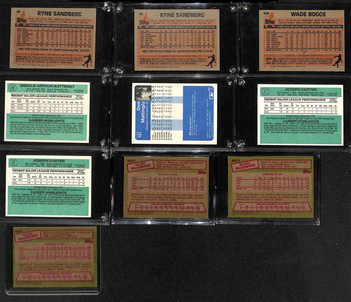 Lot of (14) 1983-85 Baseball Rookies w. (2) Sandberg, Boggs, (2) Mattingly, (2) J. Carter, (3) McGwire, Strawberry, Gooden, +