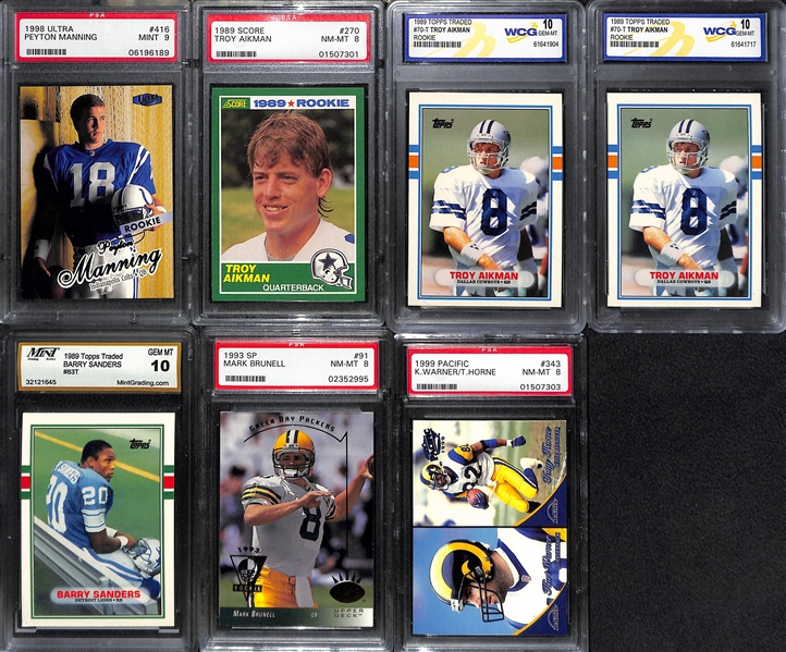 (7) Graded Football Rookie Cards w. 1998 Ultra P. Manning PSA 9, (3) Troy Aikman (Inc. 1989 Score PSA 8), B. Sanders, Brunell, K. Warner