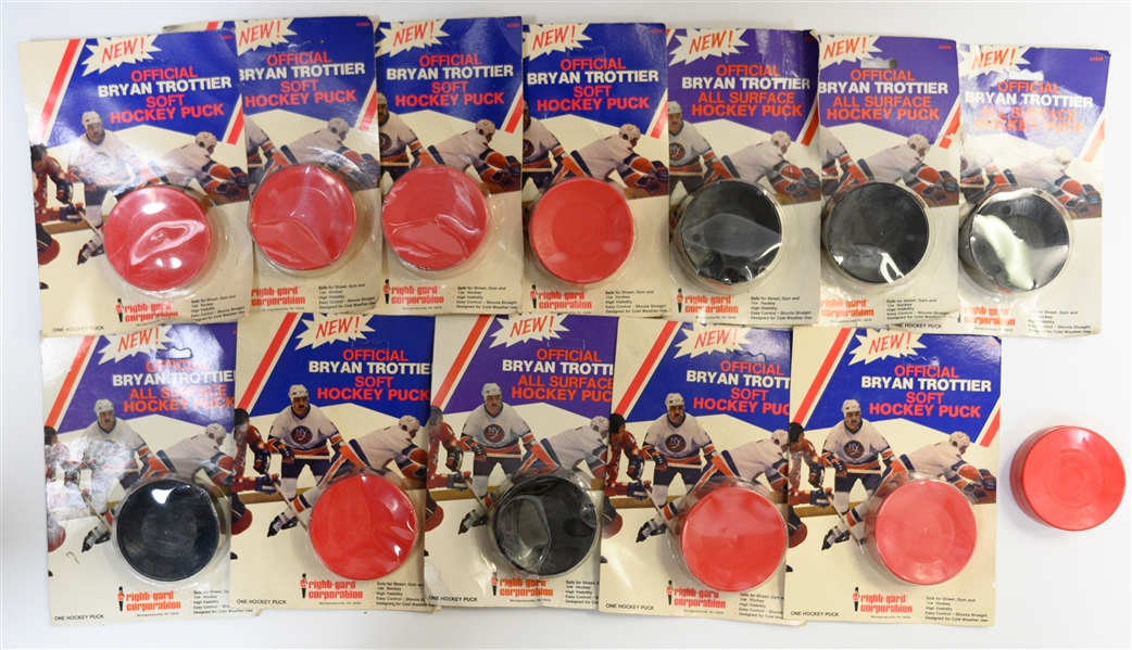 Lot of 12 Official Bryan Trottier Hockey Pucks (New York Islanders) In Original Factory Packaging