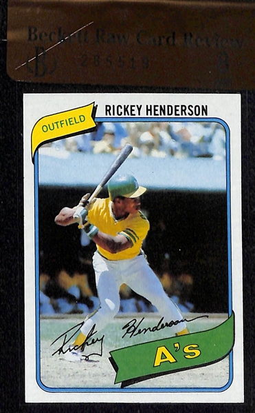 (2) 1980 Topps Rickey Henderson Rookie Cards Graded PSA 7 and Beckett Raw Card Review 8