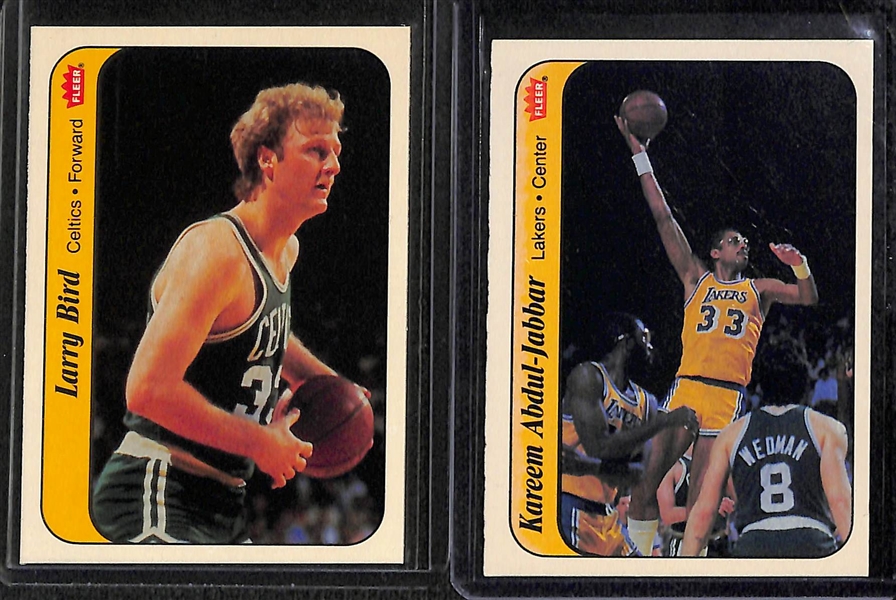 Lot of (33) 1986 Fleer Basketball Cards and Stickers Inc. Bird, Jabbar,  Wilkins