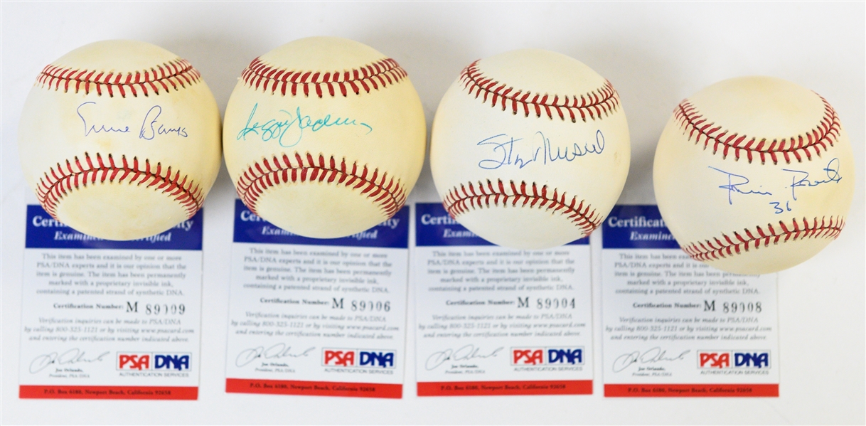 (4) Signed Baseballs Inc. Ernie Banks, Stan Musial, Reggie Jackson, Robin Roberts all PSA/DNA Certified