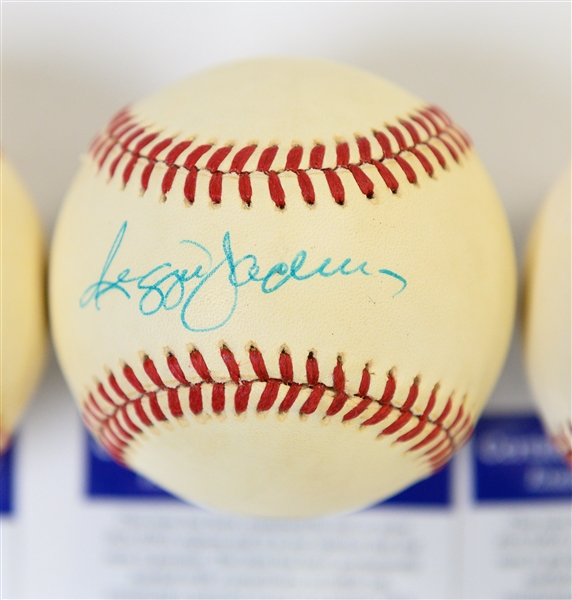 (4) Signed Baseballs Inc. Ernie Banks, Stan Musial, Reggie Jackson, Robin Roberts all PSA/DNA Certified