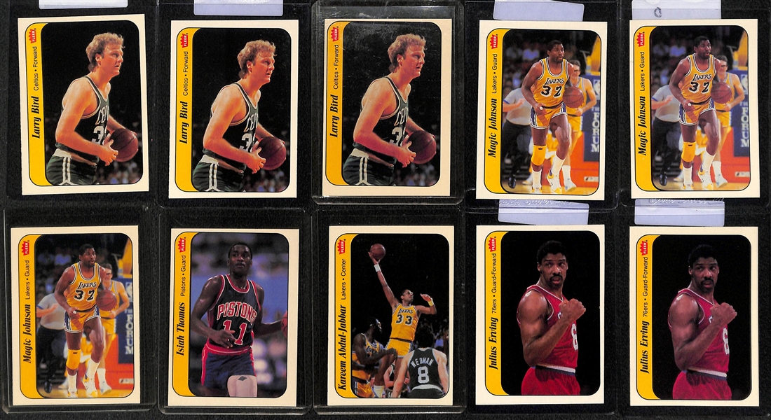 Lot of (20) 1986-87 Fleer Basketball Stickers w. M. Johnson, Bird, Jabbar, Erving, Olajuwon, Ewing, Thomas
