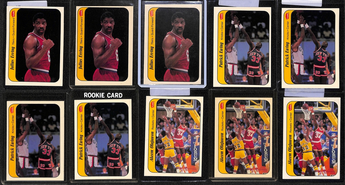 Lot of (20) 1986-87 Fleer Basketball Stickers w. M. Johnson, Bird, Jabbar, Erving, Olajuwon, Ewing, Thomas