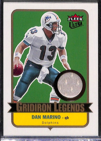 Lot of (3) Football Cards Featuring 1981 Joe Montana Rookie Card and Dan Marino Game Used Patch 