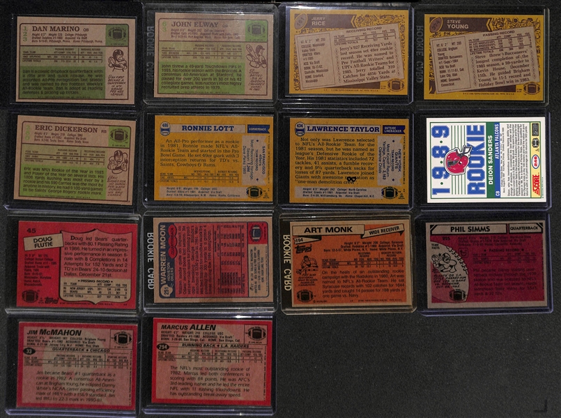 Lot of (14) 1980s Football Star Rookie Cards Feat. Marino, Elway, Rice, Taylor, Dickerson, D. Sanders, and More
