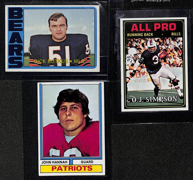 Lot of (9) 1970s and 1980s Topps Football and Baseball feat. Top Rookies from the 1986 Topps Traded Set and 1972 Roger Staubach Rookie PSA 7
