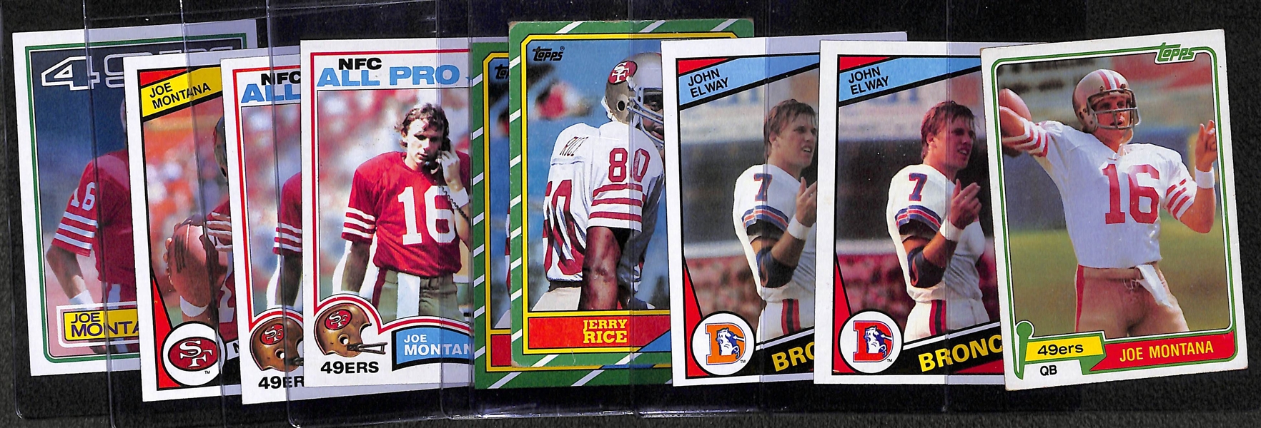 Lot of (9) 1980s Topps Football w. Montana, Elway, and Rice Rookies