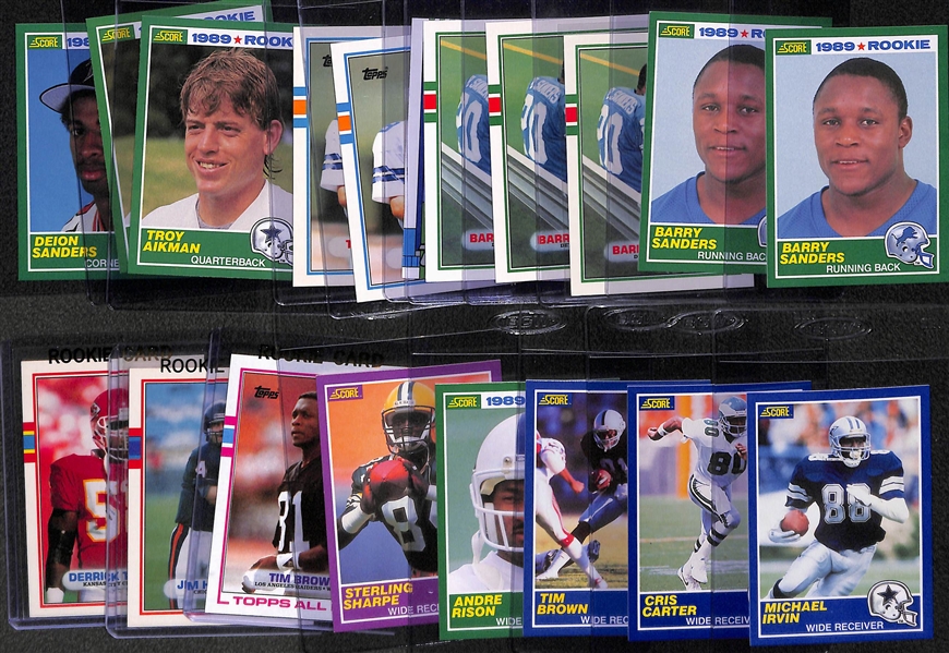 Lot of (19) 1980s Football Rookies w. (2) 1989 Score Barry Sanders, Emmitt Smith, Aikman and More.