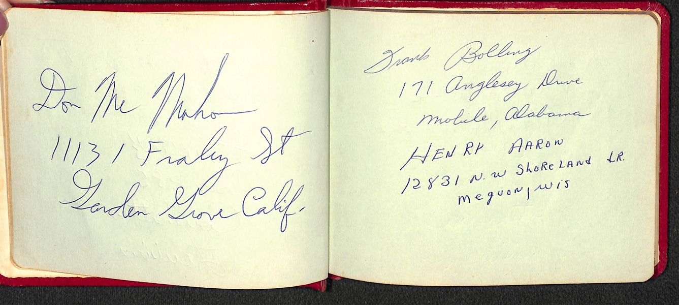 Lefty Miller's (Braves Bat Boy) Original Braves Autograph Album & 10 Wire Photos & 2x3 Photo of Miller w. Aaron (JSA Auction Letter)