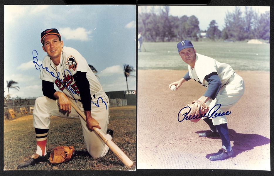 Lot of (7) Baseball Autographed 8x10 Photos - R. Henderson, Mattingly, Spahn, Drysdale, Musial, B. Robinson, & Pee Wee Reese (JSA Auction Letter)