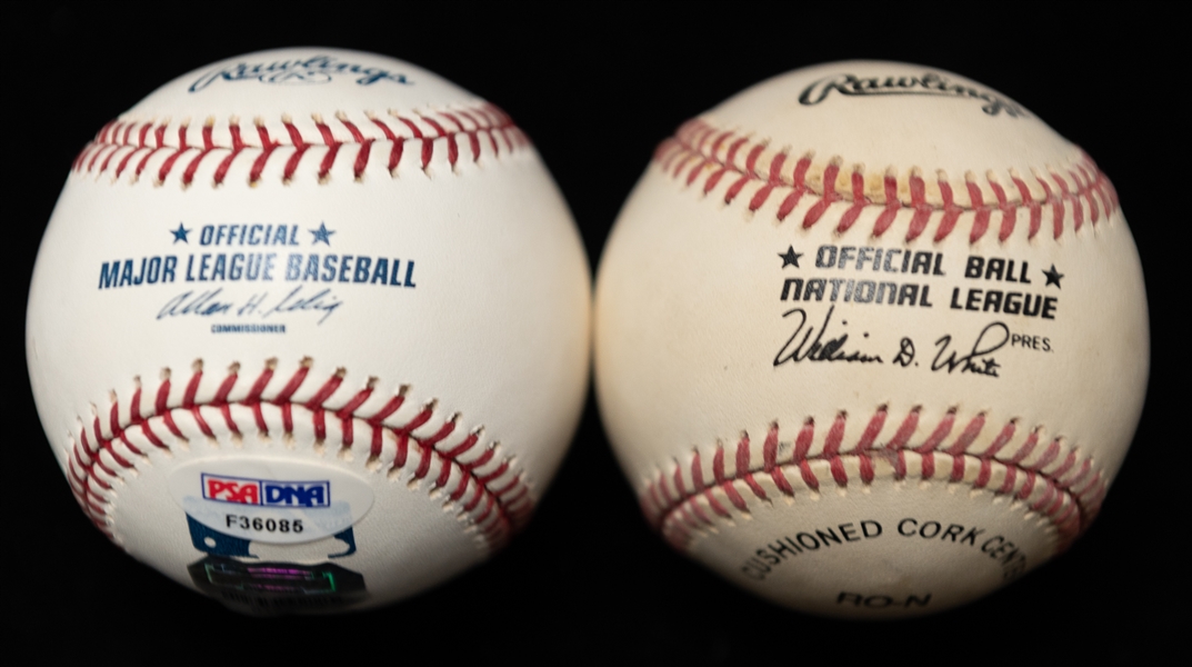 (2) Hank Aaron Autographed Official National League and Major League Baseballs (JSA and PSA Cert)