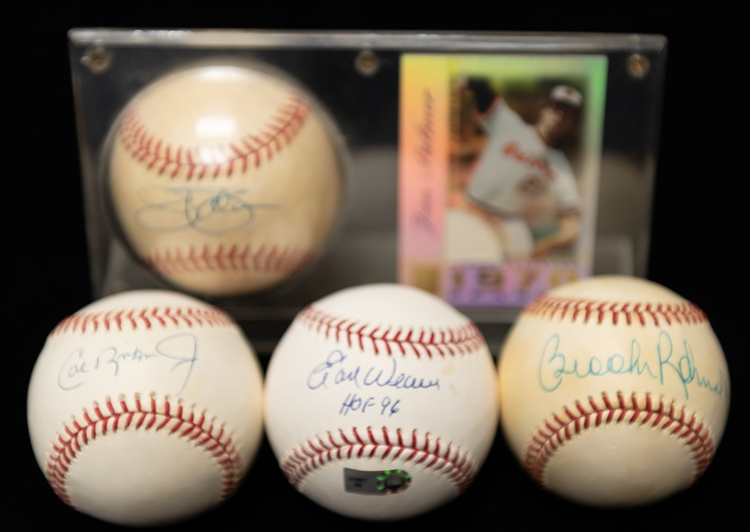 Lot of (4) Baltimore Orioles Autographed Baseballs w. Ripken Jr., B. Robinson, Palmer, and Weaver (JSA Auction Letter)