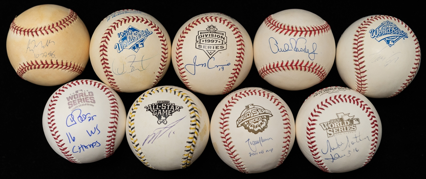 Lot (8) Autographed Mostly Official World Series Baseballs w. Randy Johnson, Jeff Conine and Others (JSA Auction Letter)