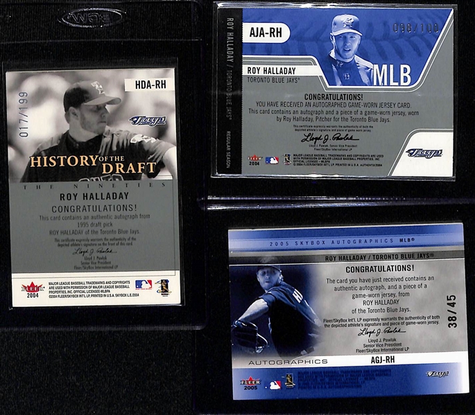 Lot of (3) Autographed Roy Halladay Cards w. 2004 Skybox Limited Edition, 2005 Skybox Autographics, and 2004 Fleer Authentix