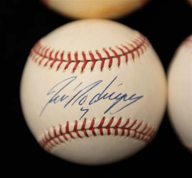 Lot of (4) HOF Catcher Autographed Baseballs w. Yogi Berra, (2) Gary Carter, and Ivan Rodriguez (JSA Auction Letter)