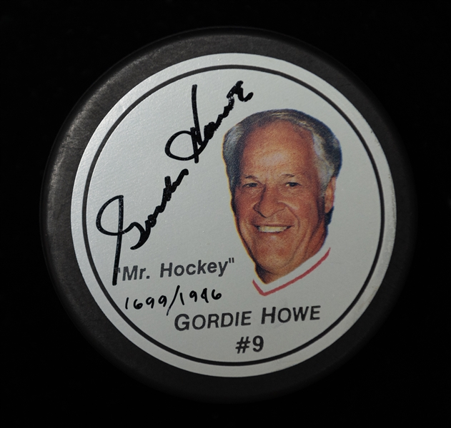 Lot of (2) Autographed Gordie Howe Hockey Pucks (JSA Auction Letter)