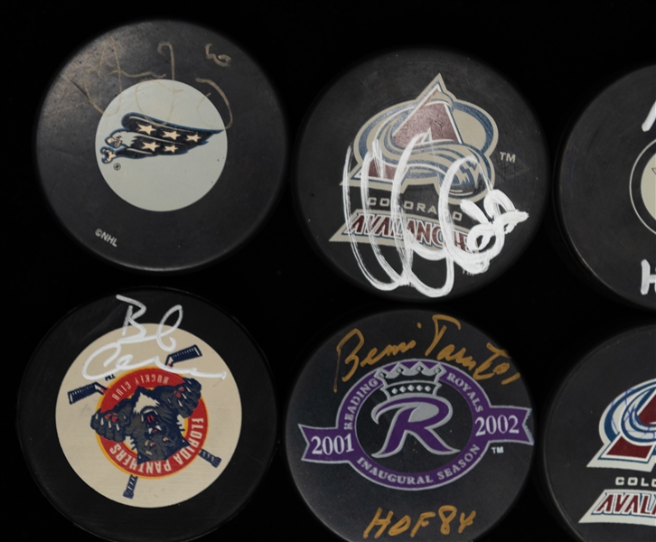Lot of (10) Autographed Hockey Pucks w. (2) Jagr, Fuhr, Parent, Bob Clark and Others (JSA Auction Letter)