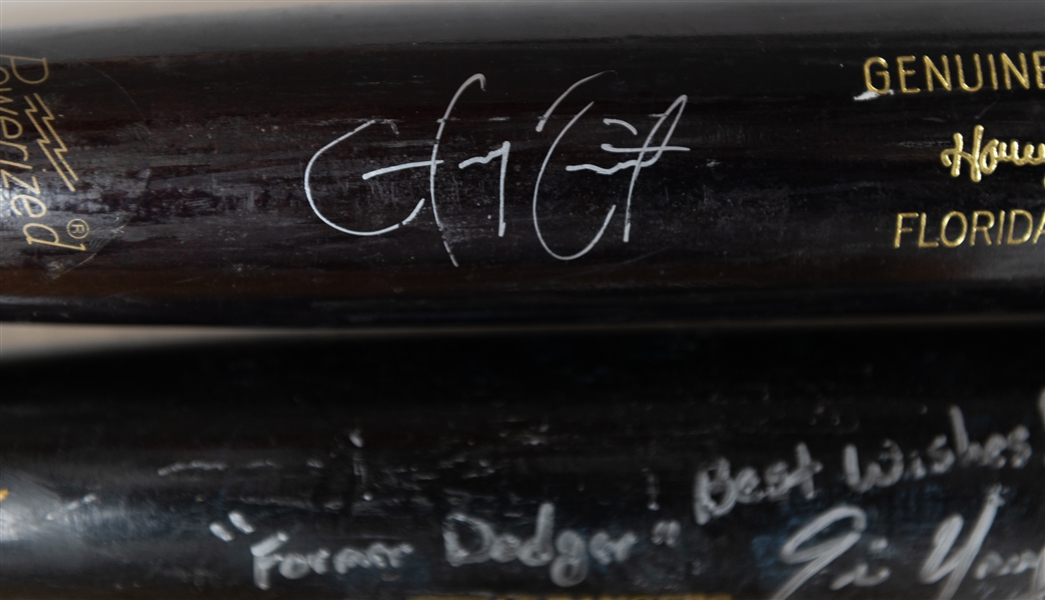Lot of (2) Team Issued Autographed Bats w. Hanley Ramirez and Eric Young (JSA Cert)