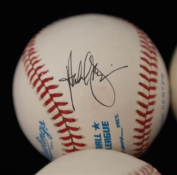 Lot of (9) Autographed Baseballs w. Mark Grace, Fred McGriff, Dave Stewart, Harold Baines, and Others (JSA Auction Letter)