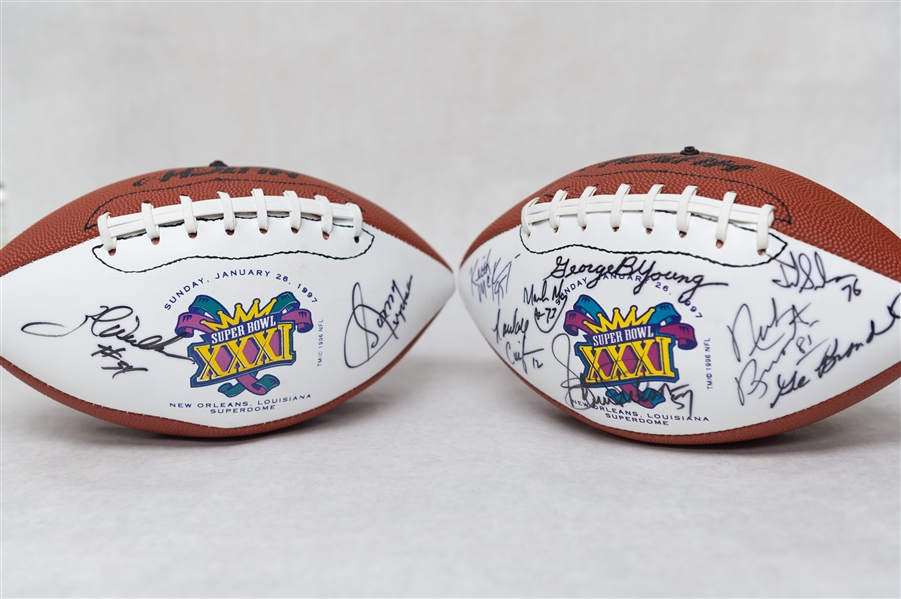 Lot of (2) Super Bowl XXXI Autographed Footballs w. (25+) Signatures Inc. Joe Theismann, Moon, R. Cunningham (JSA Auction Letter)