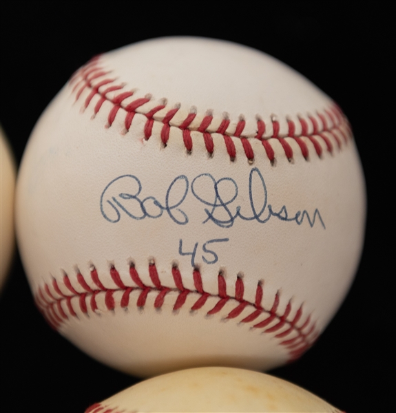 Lot of (4) MLB Pitchers Autographed Rawlings Baseballs w. Bob Gibson, Juan Marichal, and others (JSA Auction Letter)