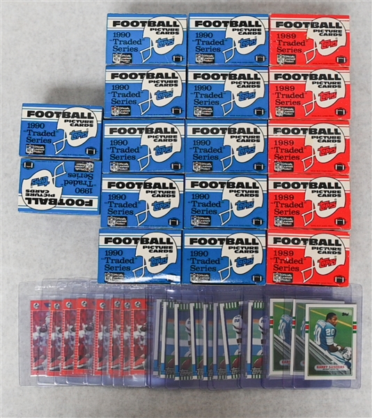 Lot of (12) 1990 Topps Traded and (5) 1989 Topps Traded Football Sets (Emmitt Smith, Barry Sanders RC) w. (10) Barry Sanders Pro Set RCs