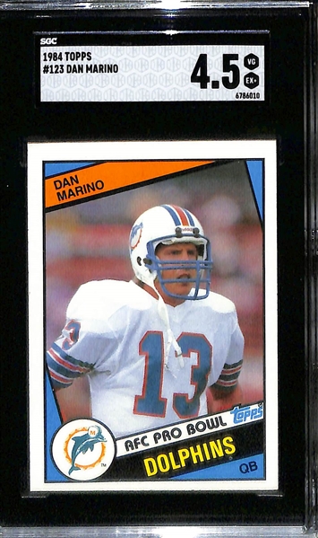 Football Rookie Lot - 1981 Topps Joe Montana (PSA 5), 1984 John Elway (SGC 8), 1984 Topps Dan Marino (SGC 4.5)